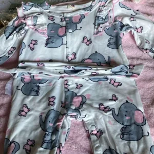 Ontvangen Baby Lange Mouwen Romper met Haarband van klant M***l.
